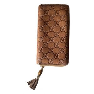 Gucci bamboo leather wallet with tassel